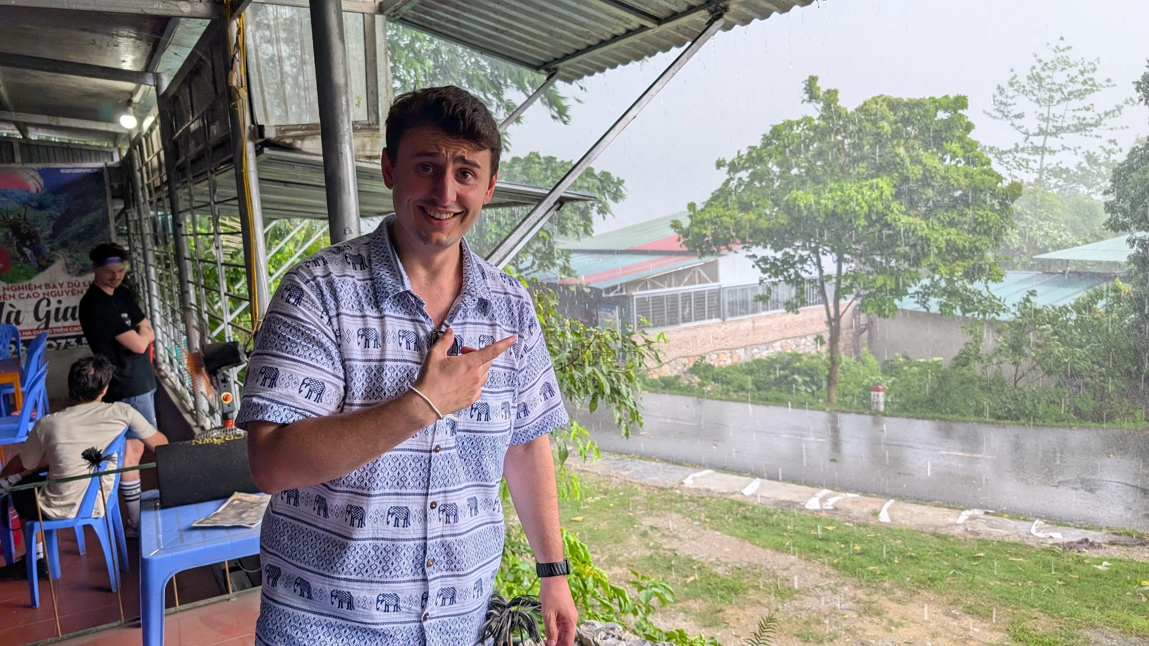 Liam in a storm in Vietnam